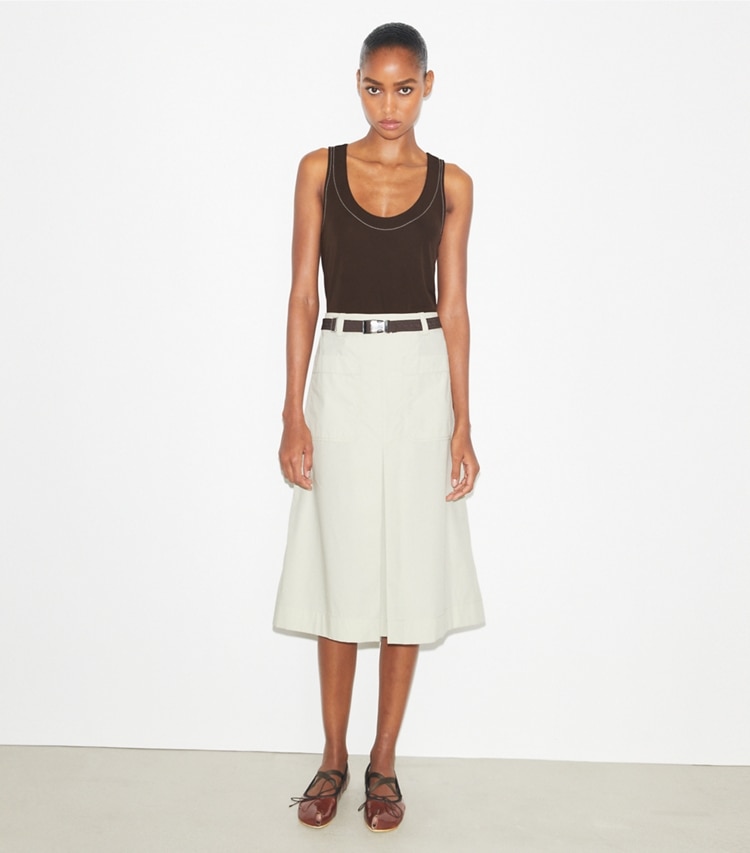 Tory Burch designer bottoms Pleated Cotton Twill Skirt in Stone on model front