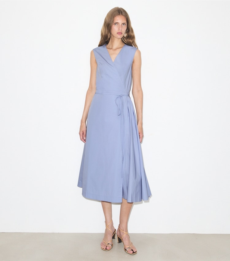 Tory Burch designer dresses Pleated Cotton Wrap Dress in Pale Blue on model front
