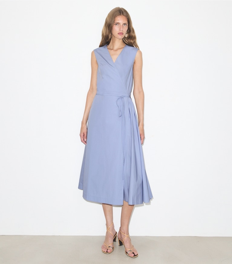 Tory Burch designer dresses Pleated Cotton Wrap Dress in Pale Blue on model front