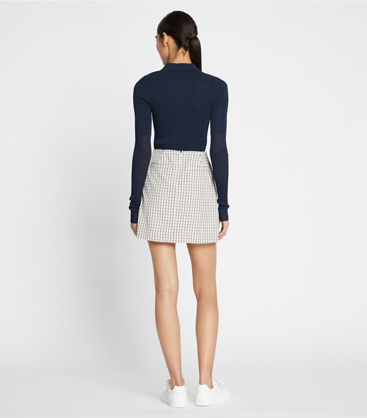 Tory Sport designer bottoms Pleated-Front Twill Golf Skirt in Sesame Mini Plaid on model back