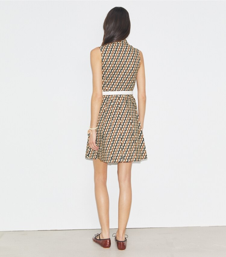 Tory Sport designer dresses Pleated Golf Dress in Tory Navy Linked Geo Multi-Color on model back