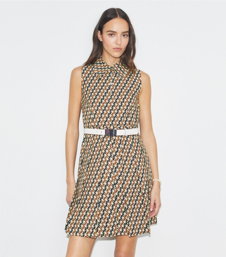 Tory Sport designer dresses Pleated Golf Dress in Tory Navy Linked Geo Multi-Color on model detail