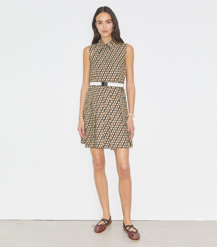 Tory Sport designer dresses Pleated Golf Dress in Tory Navy Linked Geo Multi-Color on model front