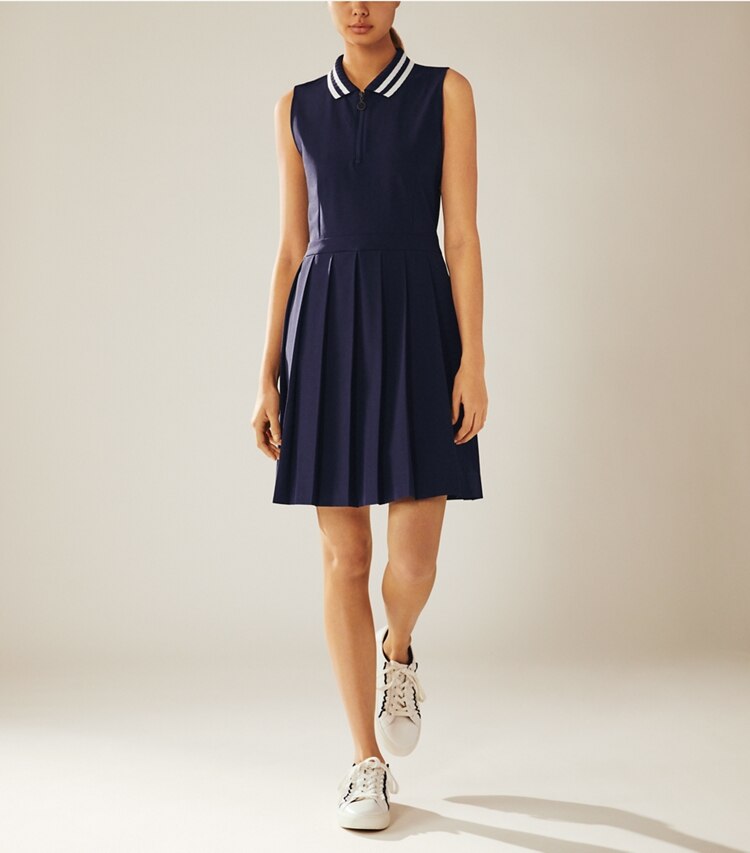 Tory Sport designer dresses Pleated Golf Dress in Tory Navy on model front