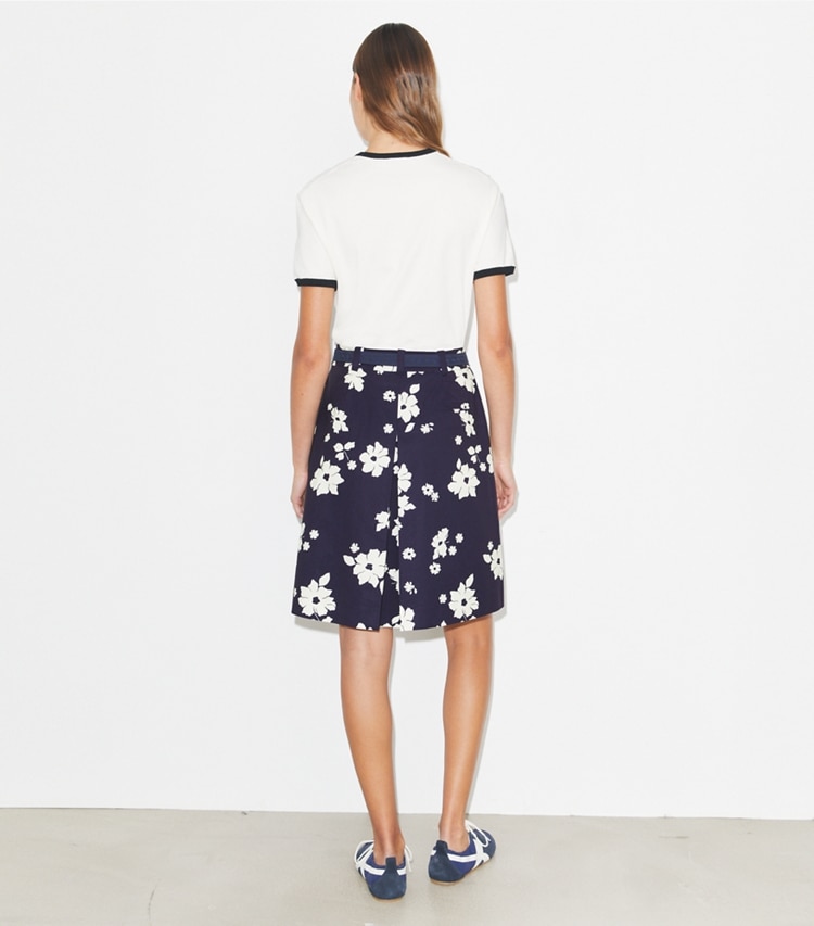 Tory Burch designer bottoms Pleated Golf Skirt in Medium Navy Contrast Floral on model back