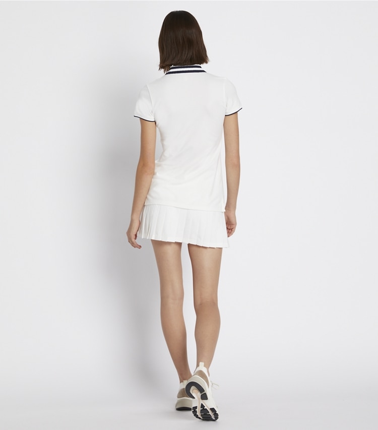 Tory Sport designer bottoms Pleated-Hem Tennis Skirt in Snow White on model back