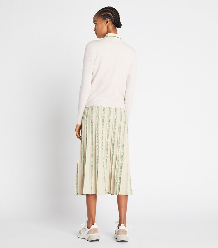 Tory Sport designer bottoms Pleated Jacquard Tech Knit Skirt in Pale Stone Chainlink Logo on model back