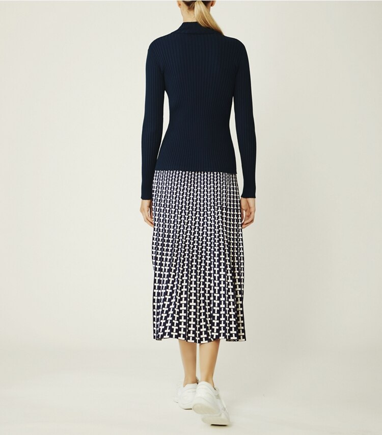 Tory Sport designer bottoms Pleated Jacquard Tech Knit Skirt in Tory Navy Two Way T on model back
