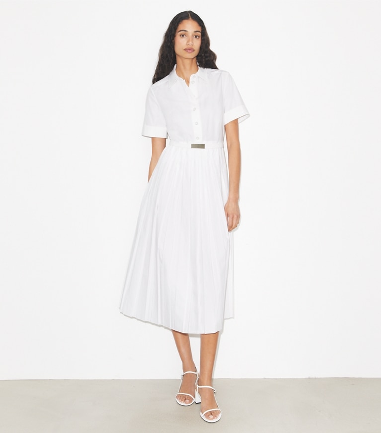 Tory Burch designer dresses Pleated Poplin Shirtdress in White on model front