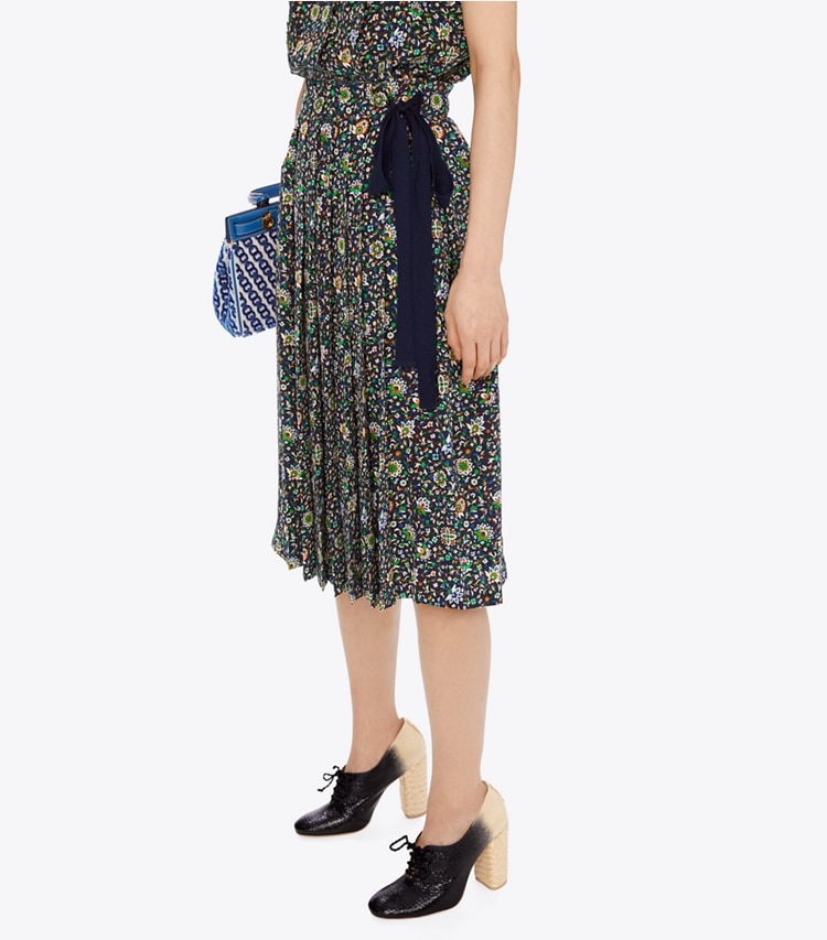Tory Burch designer bottoms Pleated Silk Wrap Skirt in Navy Soleil accessory on model