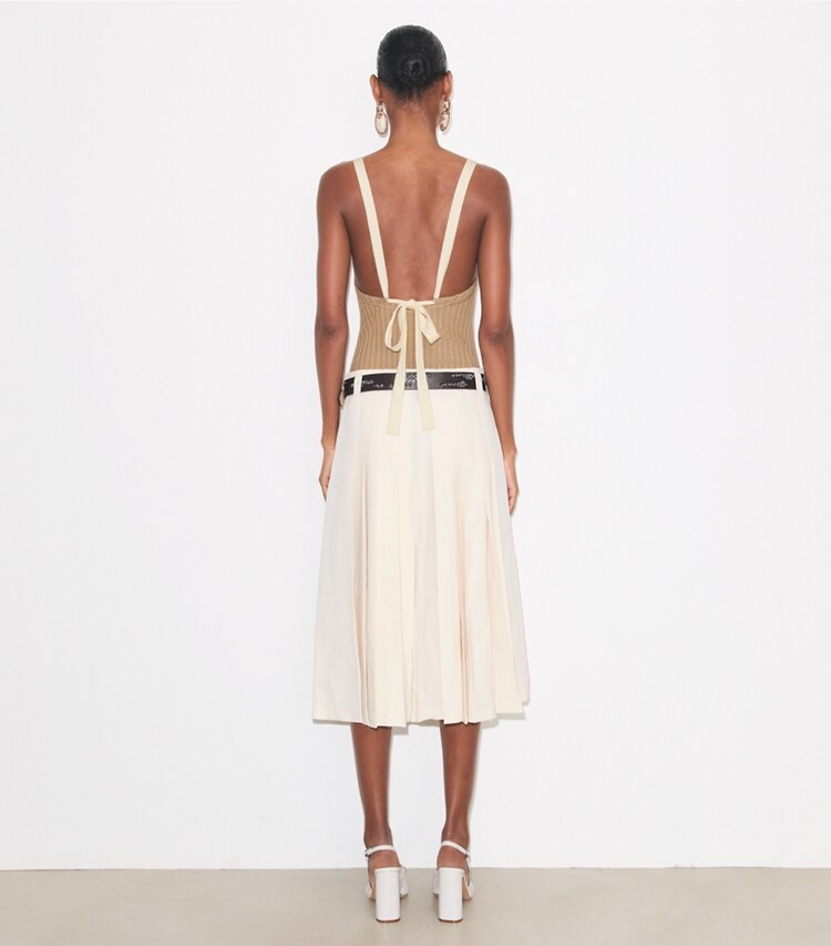 Tory Burch designer bottoms Pleated Skirt in Cream on model back