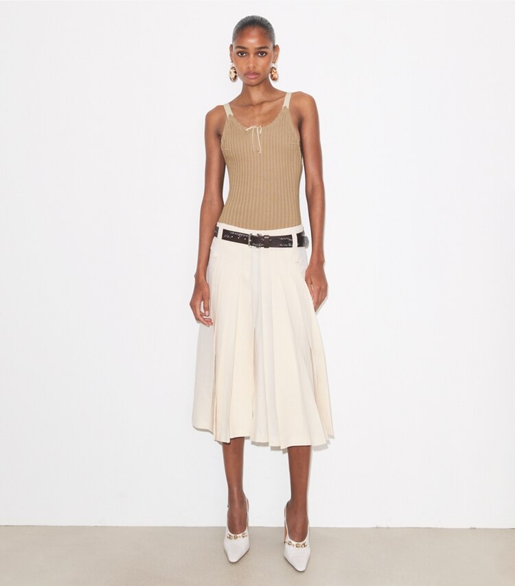 Tory Burch designer bottoms Pleated Skirt in Cream on model front