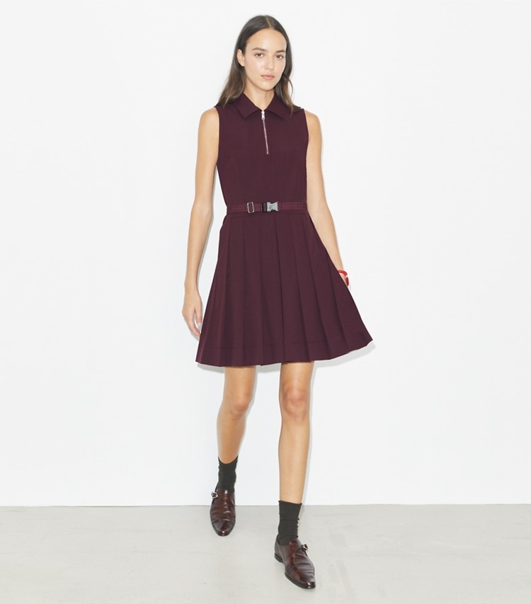 Tory Burch designer dresses Pleated Stretch Golf Dress in Dark Sangria on model front