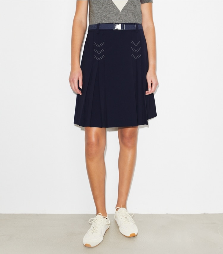 Tory Burch designer bottoms Pleated Stretch Golf Skirt in Deep Navy on model detail
