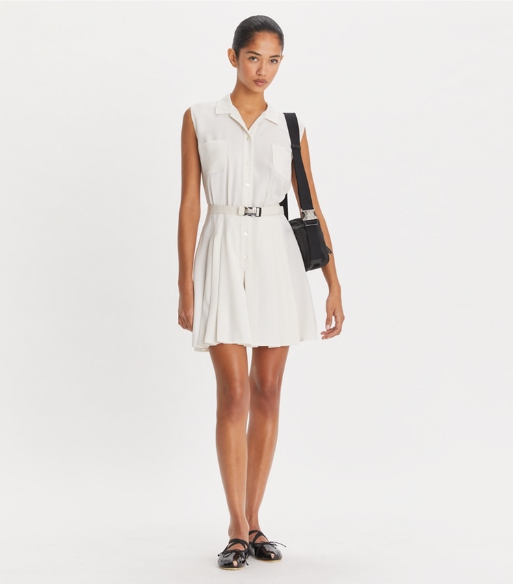 Tory Sport designer jumpsuits & rompers Pleated Twill Dress in Parchment White on model front