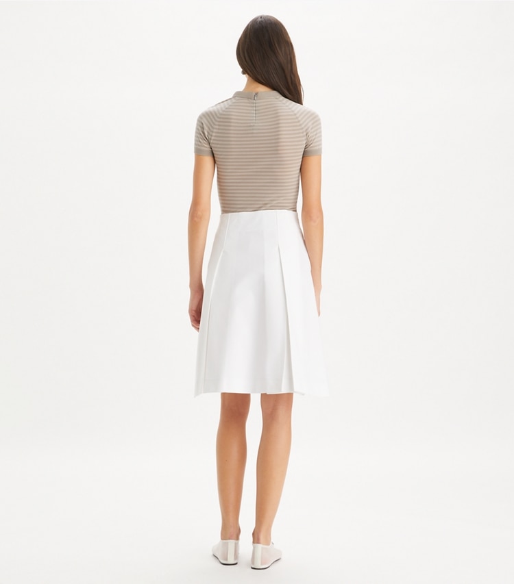 Tory Burch designer bottoms Pleated Twill Skirt in White on model back