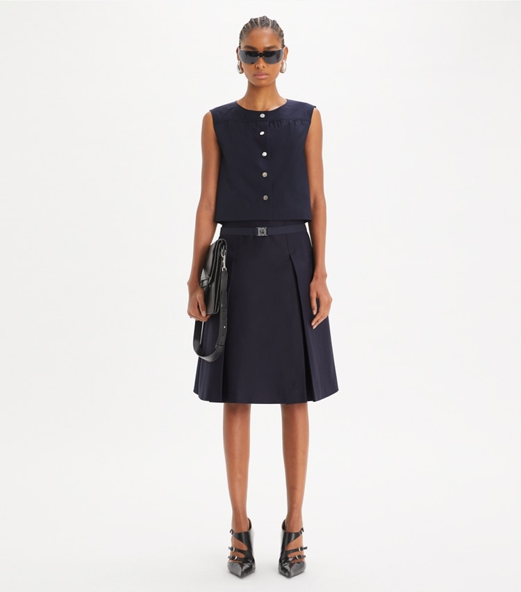 Tory Burch designer bottoms Pleated Twill Skirt in Medium Navy on model front
