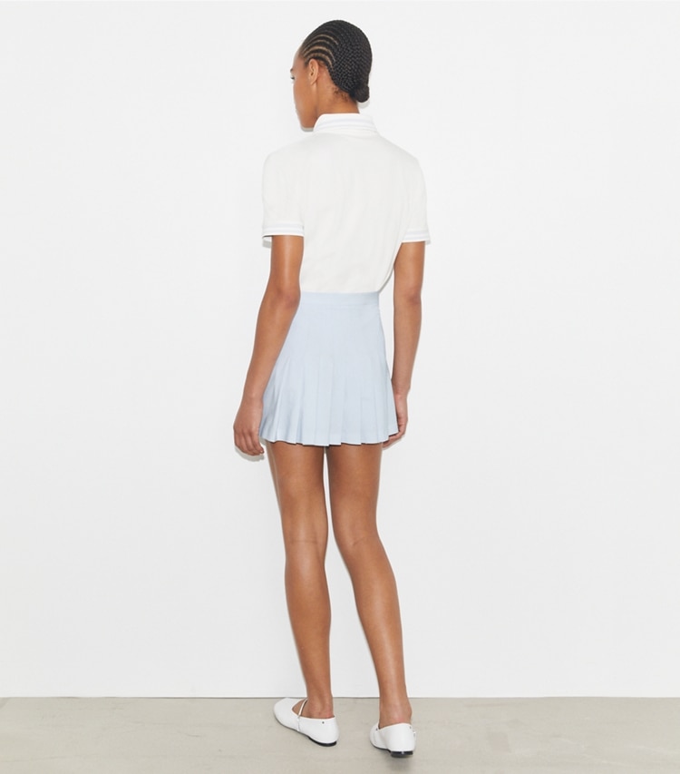 Tory Sport designer ボトムス プリーツ ツイル テニススカート in Light Blue on model back