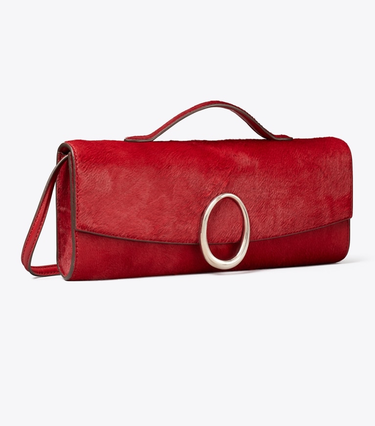 Tory Burch designer pochettes Pochette Pierced en cuir de veau façon poulain dans Toucan Red angle
