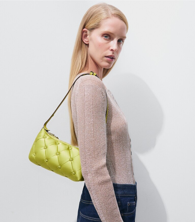 Tory Burch designer borse a spalla Pochette Bunny Knot in raso in Vibrant Green additional on model