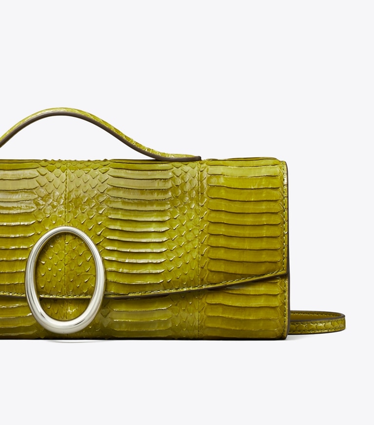 Tory Burch designer pochettes Pochette Pierced en cuir de serpent in Moss informations