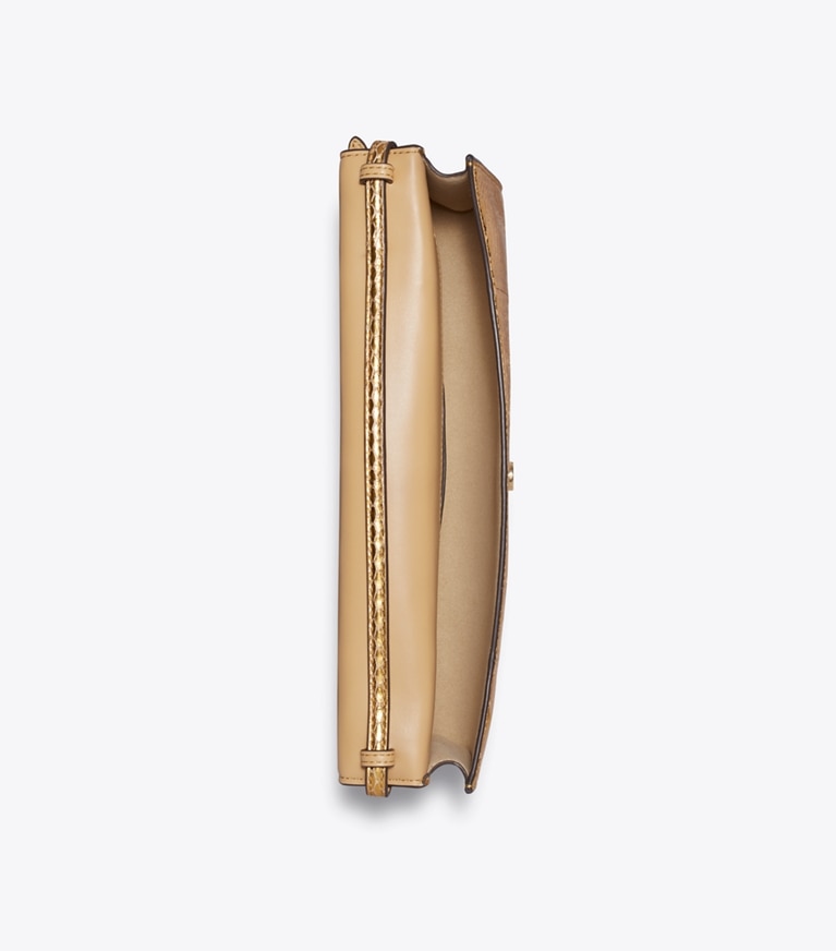 Tory Burch designer pochettes Pochette Pierced en peau de serpent dans Gold vue du dessus