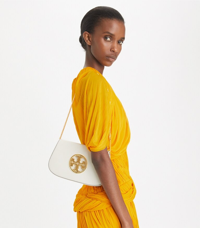 Tory Burch designer pochettes Pochette Reva dans NEW IVORY accessoire sur le modèle
