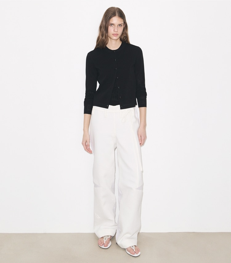 Tory Burch designer sweaters Pointelle Viscose Cardigan in Black on model front