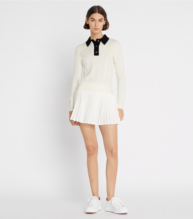 Tory Sport designer sweaters Polo à manches longues en coton pointelle dans NEW IVORY sur modèle, de face