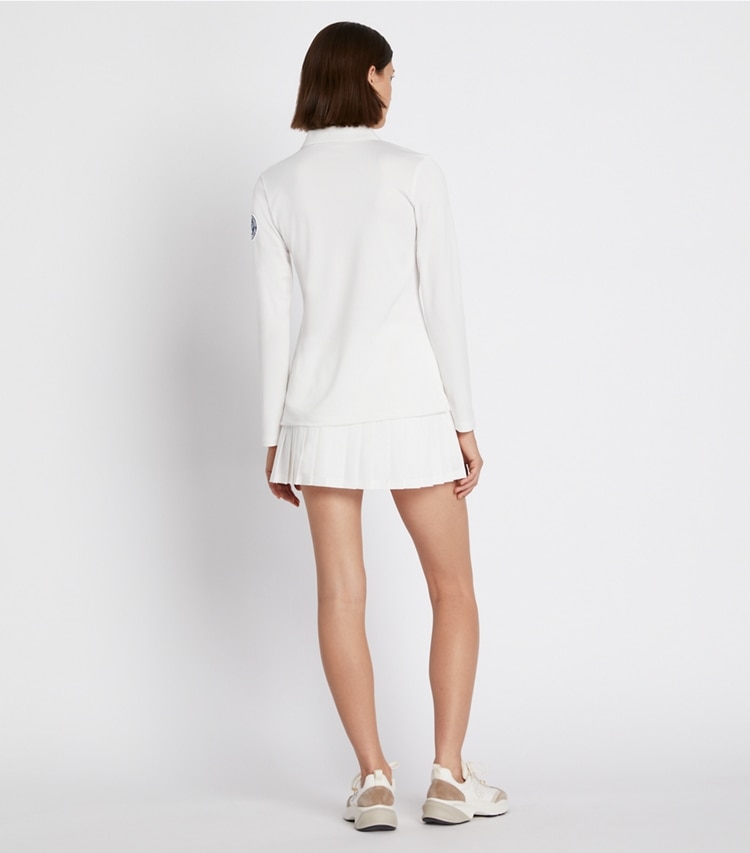 Tory Sport designer hauts Polo à manches longues dans Snow White sur modèle, de dos