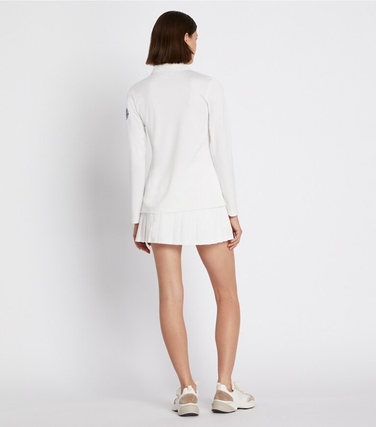 Tory Sport designer hauts Polo à manches longues dans Snow White sur modèle, de dos