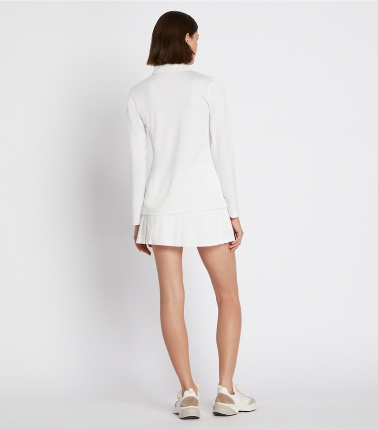 Tory Sport designer hauts Polo classique à manches longues en piqué technique in Snow White front