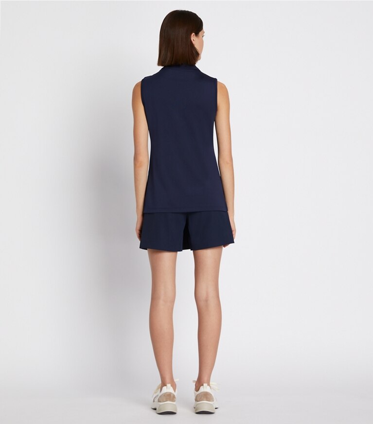 Tory Sport designer hauts Polo classique sans manches en piqué technique in Tory Navy on model back