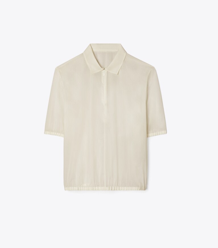 Tory Burch diseñador tops Polo de popelina con cremallera en Pale Sandstone frente