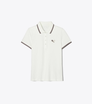 Tory Burch designer hauts Polo de tennis en piqué technique in Snow White / Dark Sangria front