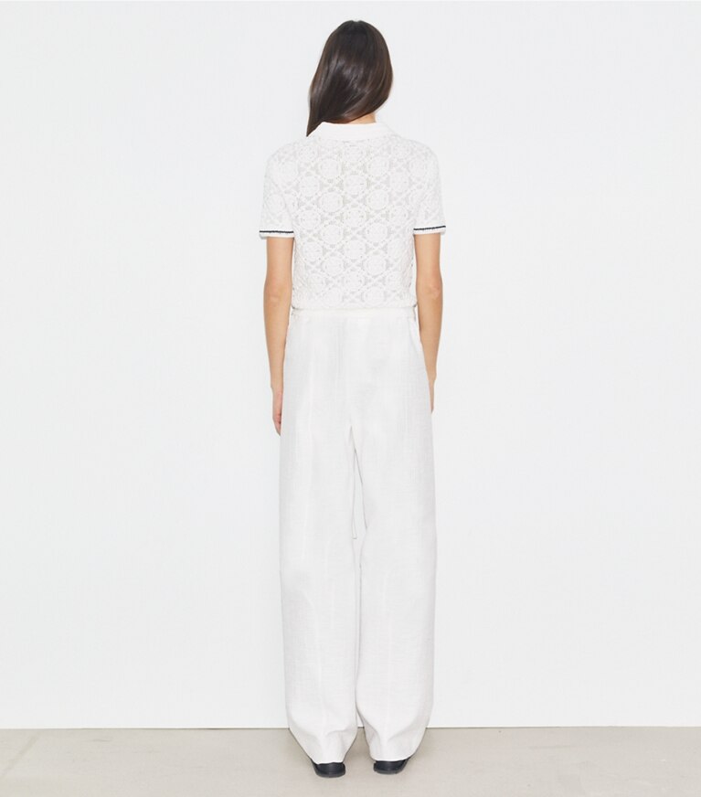Tory Burch designer sweaters Polo en coton à logo et dentelle dans White sur modèle, de dos