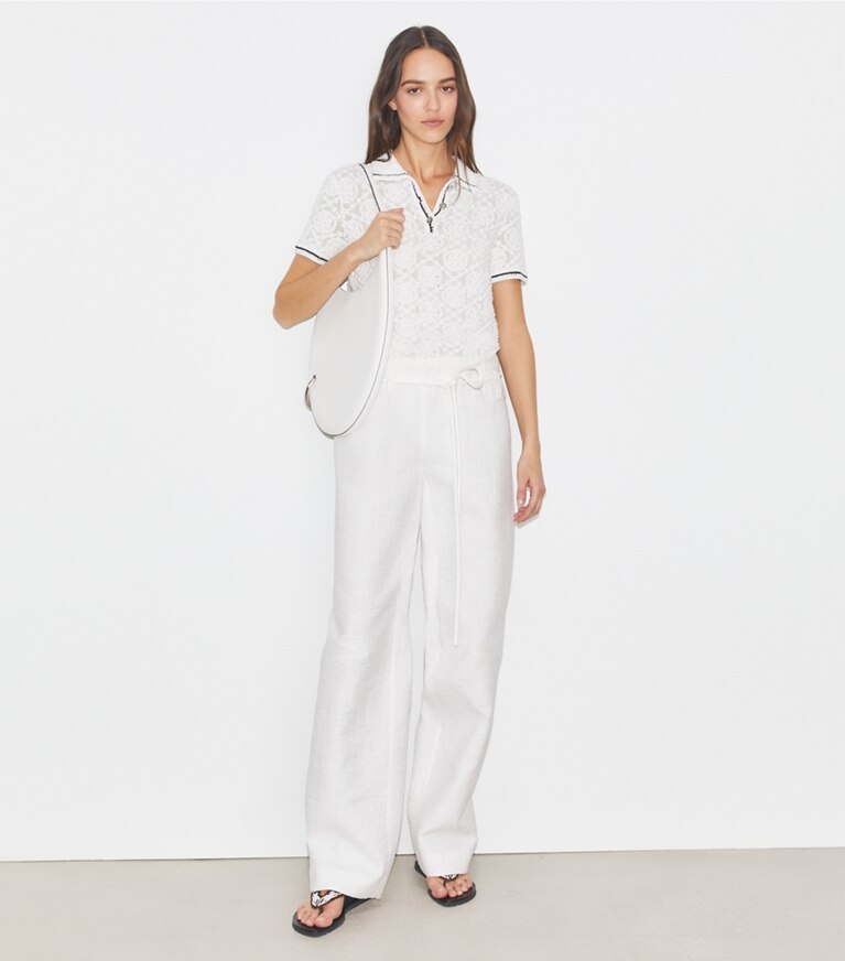 Tory Burch designer sweaters Polo en coton à logo et dentelle dans White sur modèle, de face