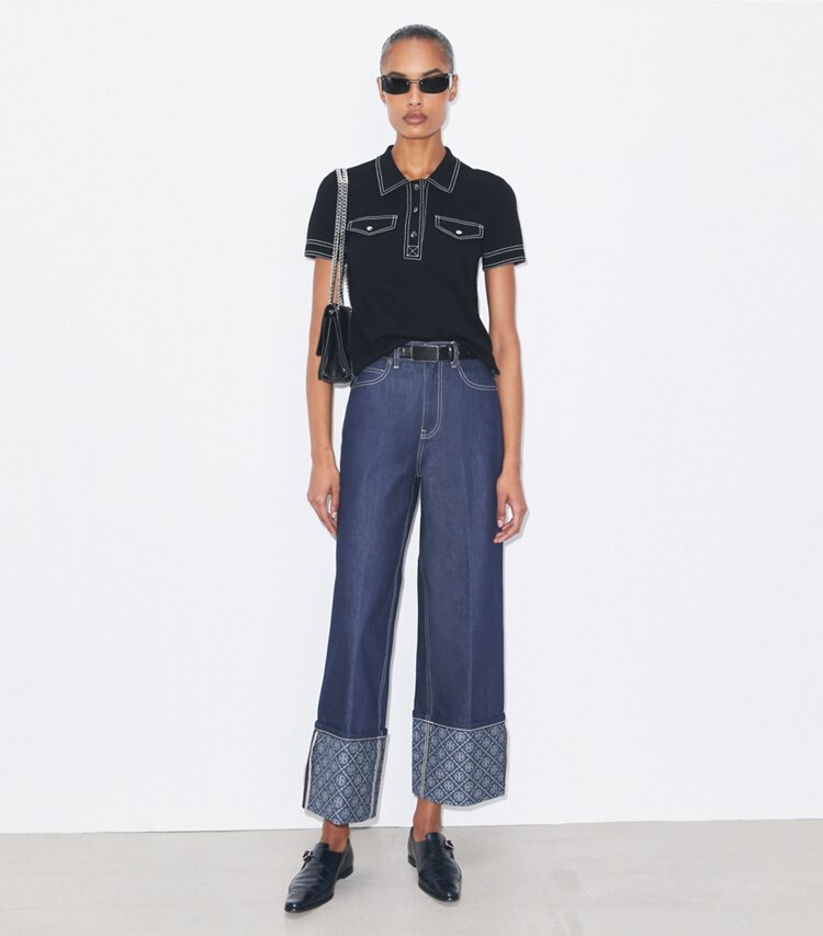 Tory Burch designer sweaters Polo en laine surpiqué dans Black sur modèle, de face