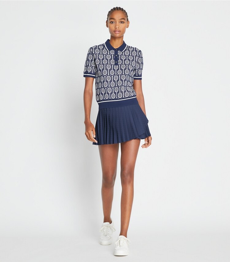 Tory Sport designer sweaters Polo en maille technique in Tory Navy Racquets sur mannequin, devant