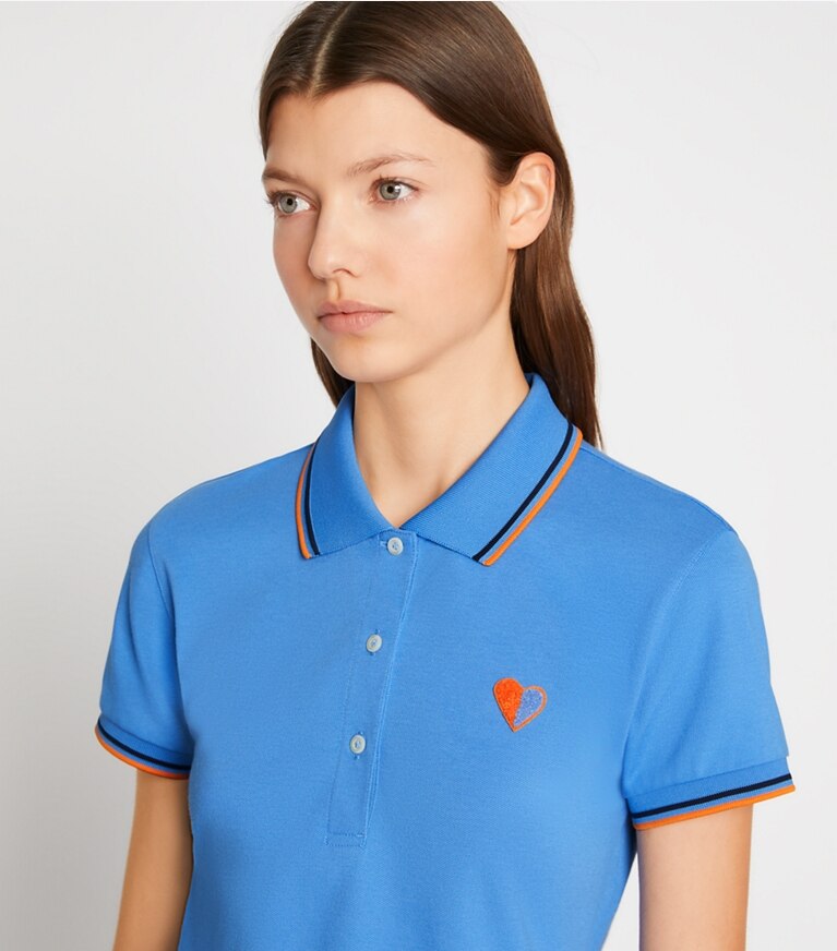 Tory Burch designer tops Polo Heart in piqué tecnico in Sunny Blue on model detail