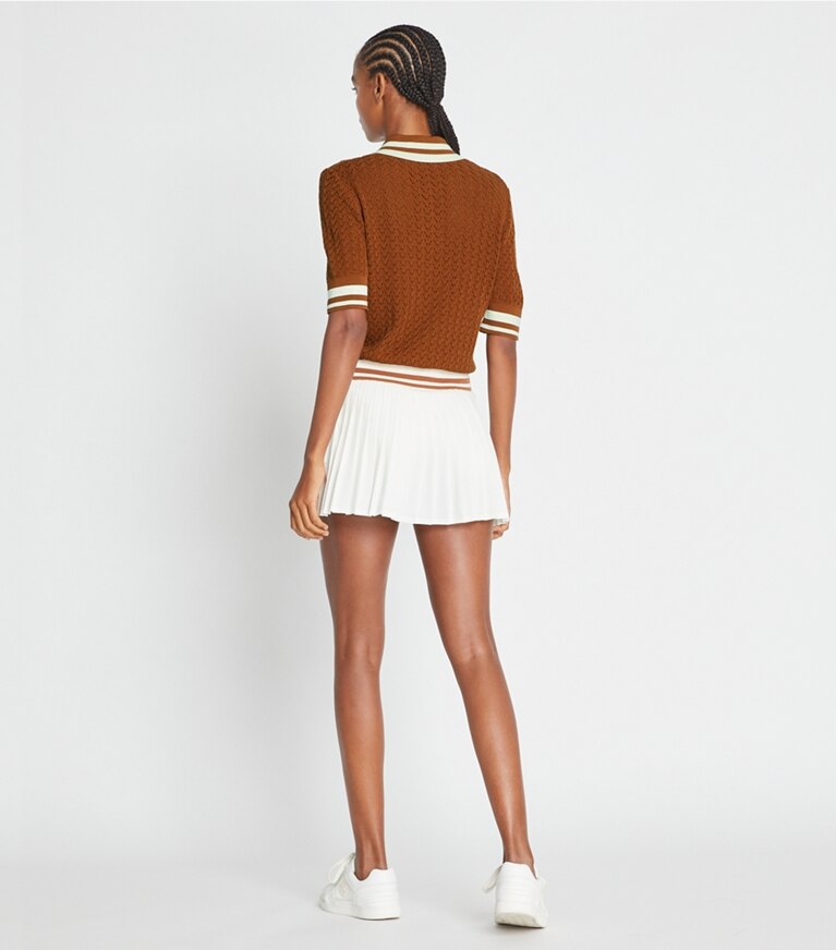 Tory Sport designer maglioni Polo in cotone traforato in Cinnamon Sugar / NEW IVORY front