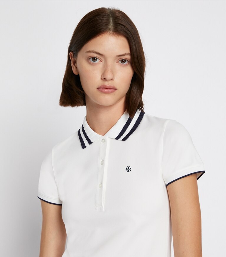 Tory Sport designer tops Polo Performance con collo plissettato in piqué in Snow White/Tory Navy front