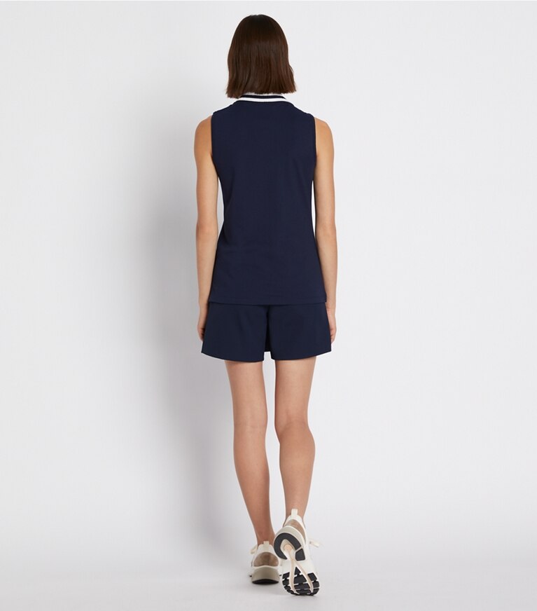 Tory Sport designer tops Polo Performance senza maniche con collo plissettato in piqué in Tory Navy/Snow White front