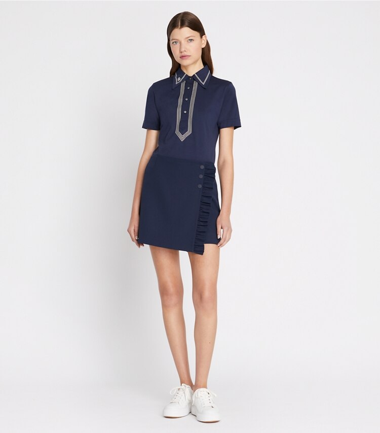 Tory Burch designer hauts Polo rétro en coton mercerisé dans Tory Navy sur modèle, de face