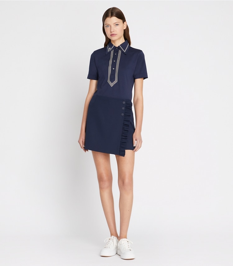 Tory Burch diseñador tops Polo retro de algodón mercerizado en Tory Navy en el modelo (frente)