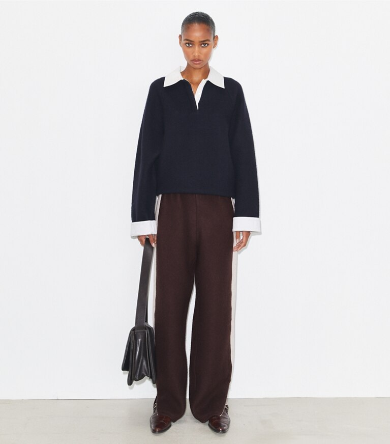Tory Burch designer hauts Polo rugby en laine dans Navy / Ivory sur modèle, de face