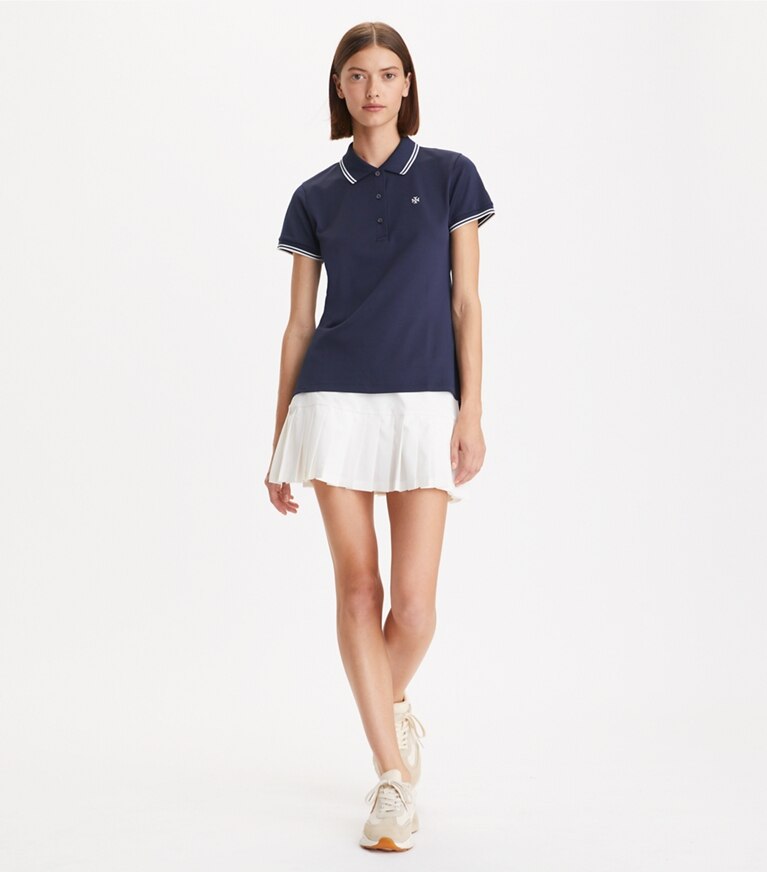 Tory Sport designer hauts Polo Tech Piqué dans Tory Navy sur modèle, de face