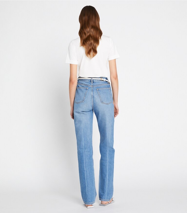 Tory Sport designer tops Polo tecnica a tunica in Snow White on model back