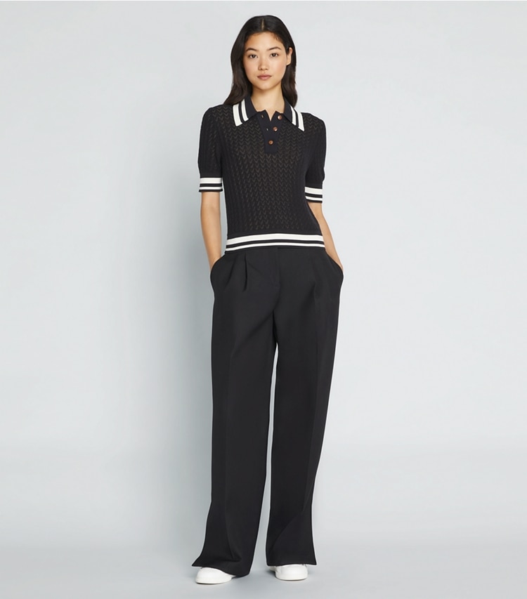 Tory Sport designer strickware Poloshirt aus Baumwolle mit Pointelle-Muster in Black / New Ivory modell von vorn
