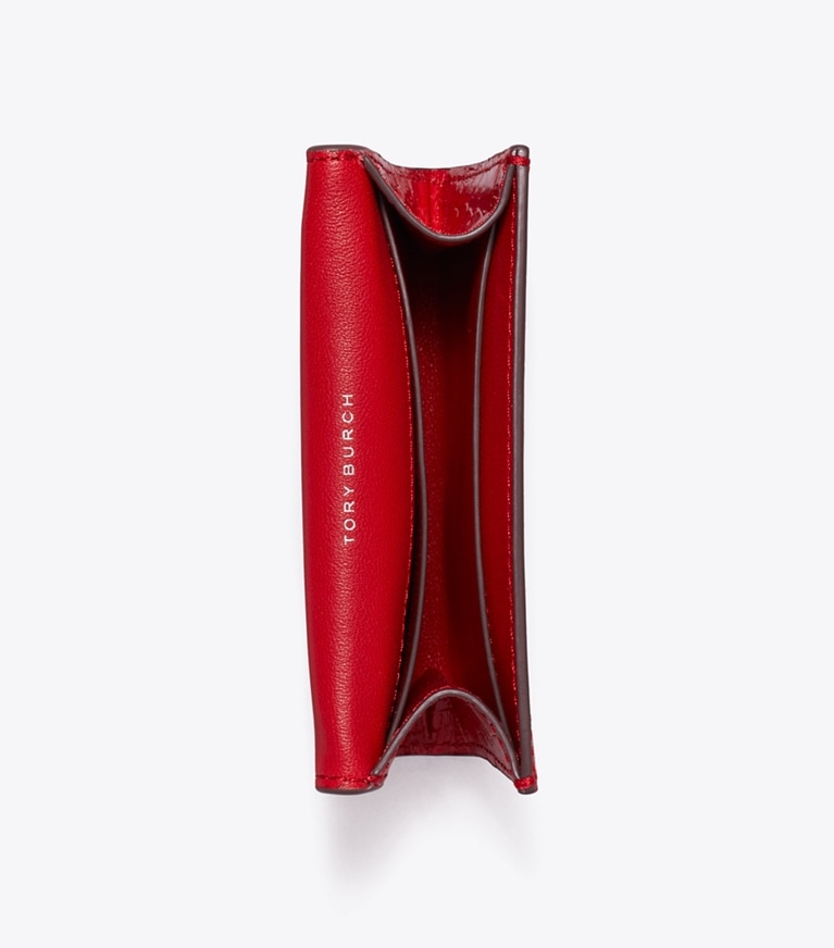 Tory Burch designer portacarte Portacarte Kira effetto coccodrillo con pattina in Red Sky angle